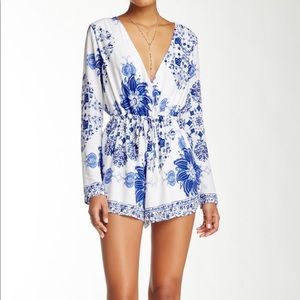 Brand new LOVECAT floral romper